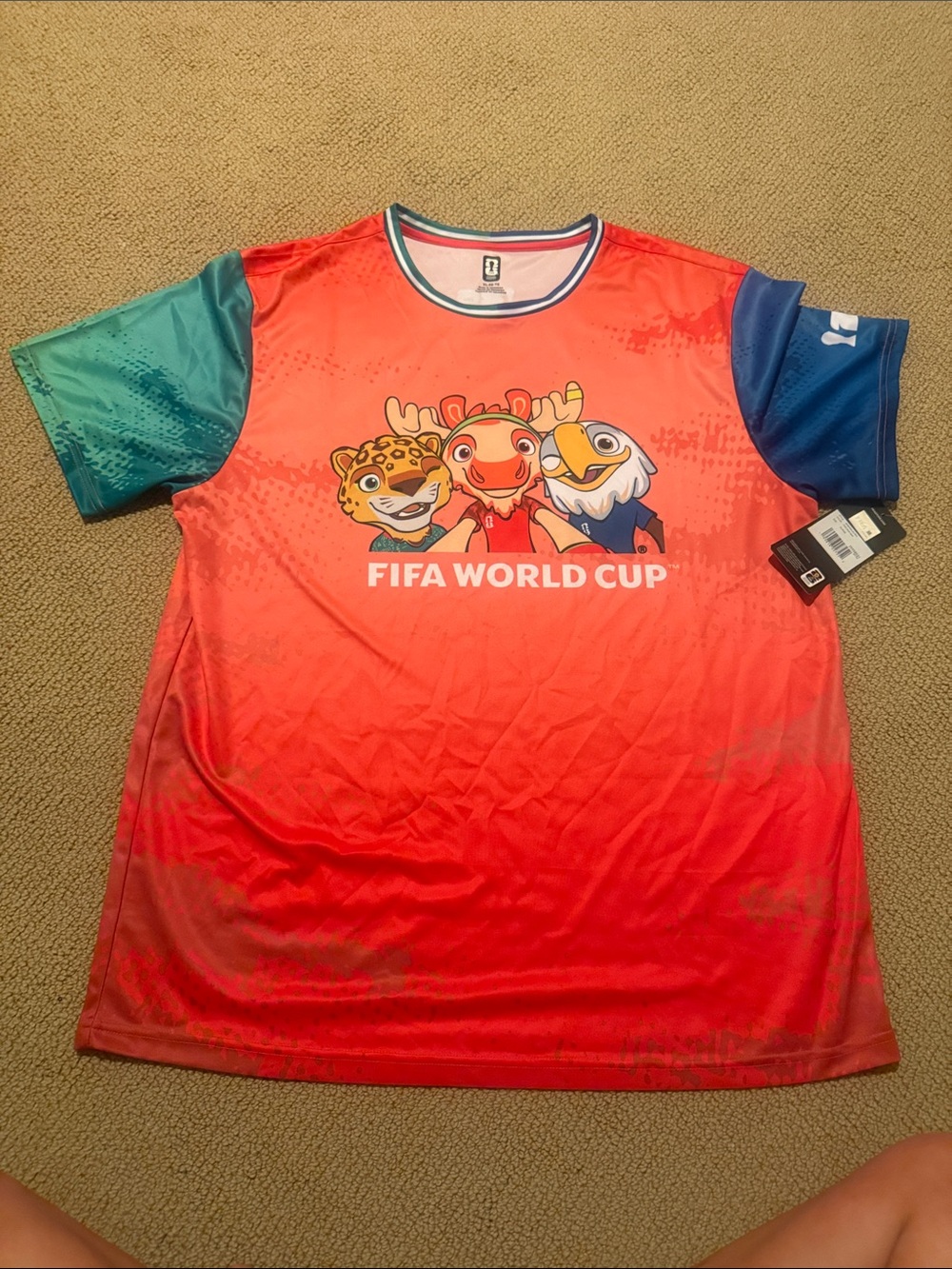 Brand new NWT blue and orange mascot jersey Tee with FIFA Graphic size xl